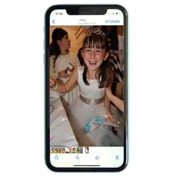 Mobile phone showing transferred photo.
