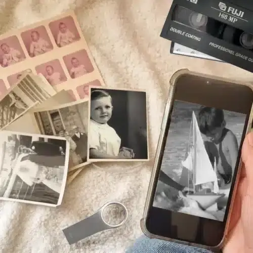 Close up of converted media on a mobile phone and a USB memory stick