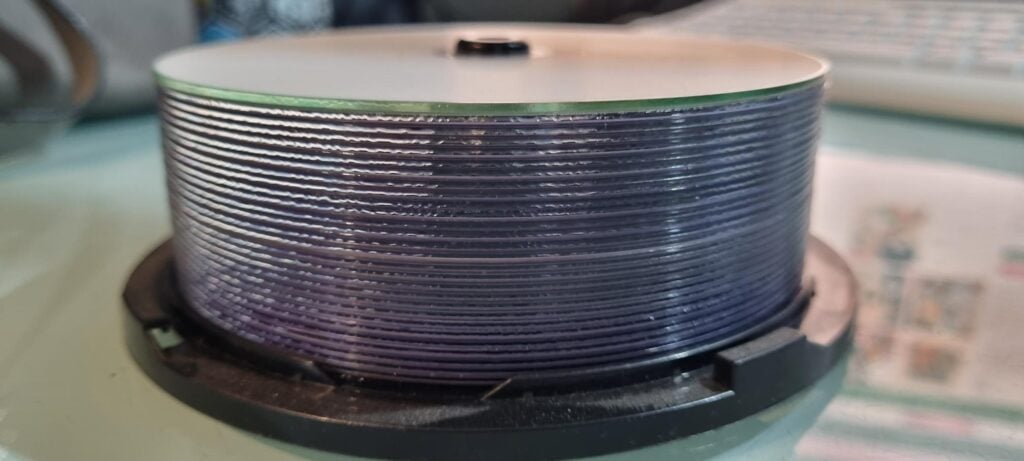 A stack of discs that need converting to digital