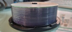 A stack of discs that need converting to digital