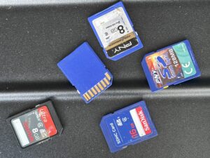 SD cards layed out on a table.