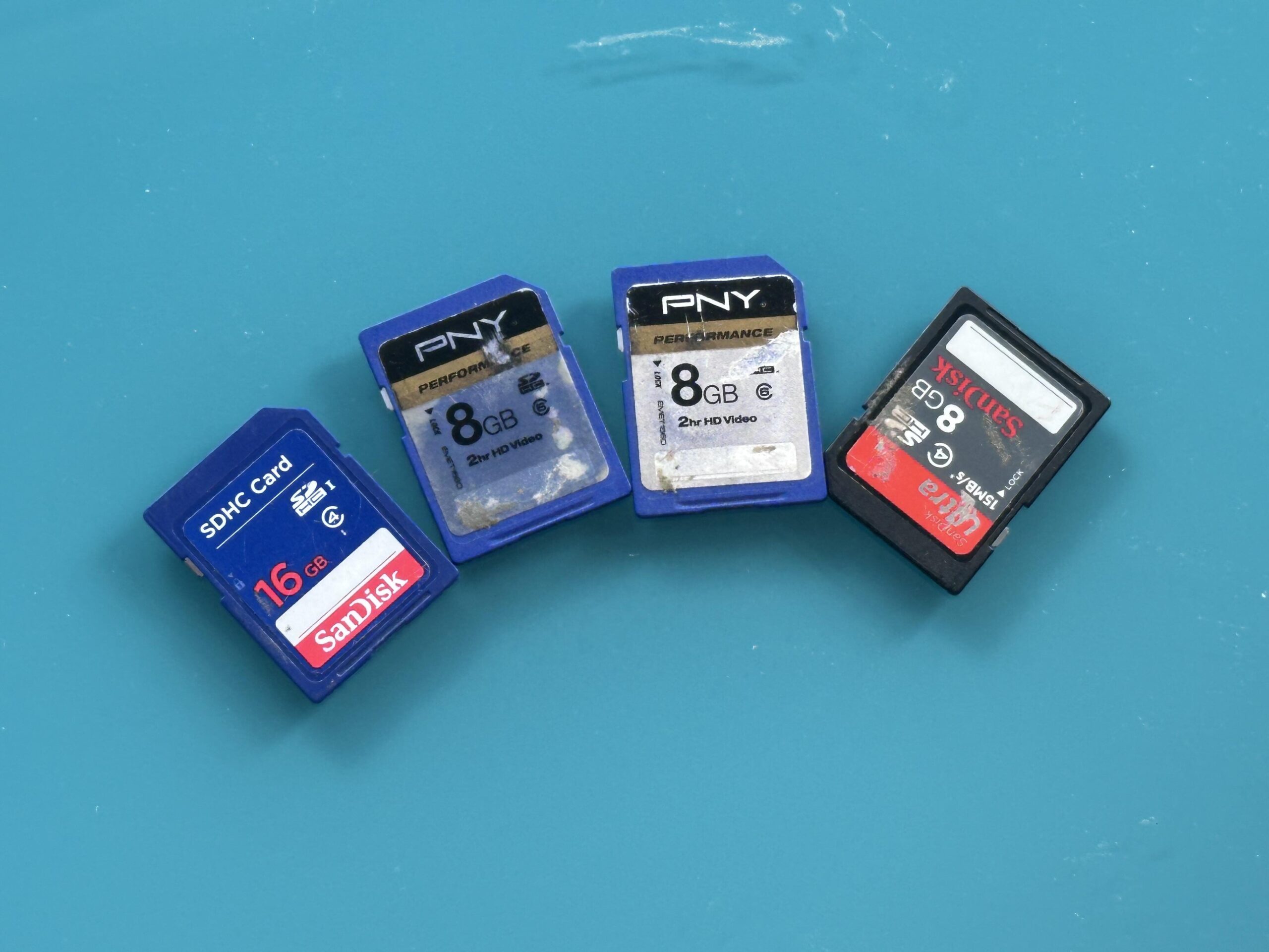 SD cards layed out on a table.